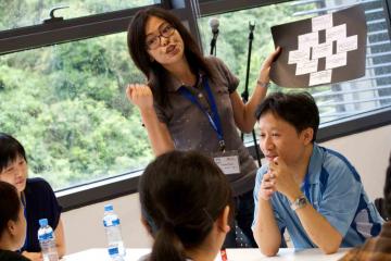 team collaborate in innovative team building game speak up speak out