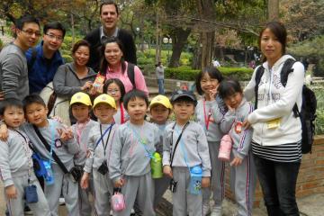 employees with group of children CSR activity kids