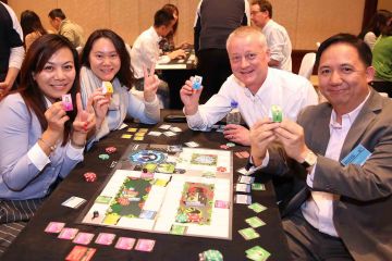 people playing freshbiz experiential business game