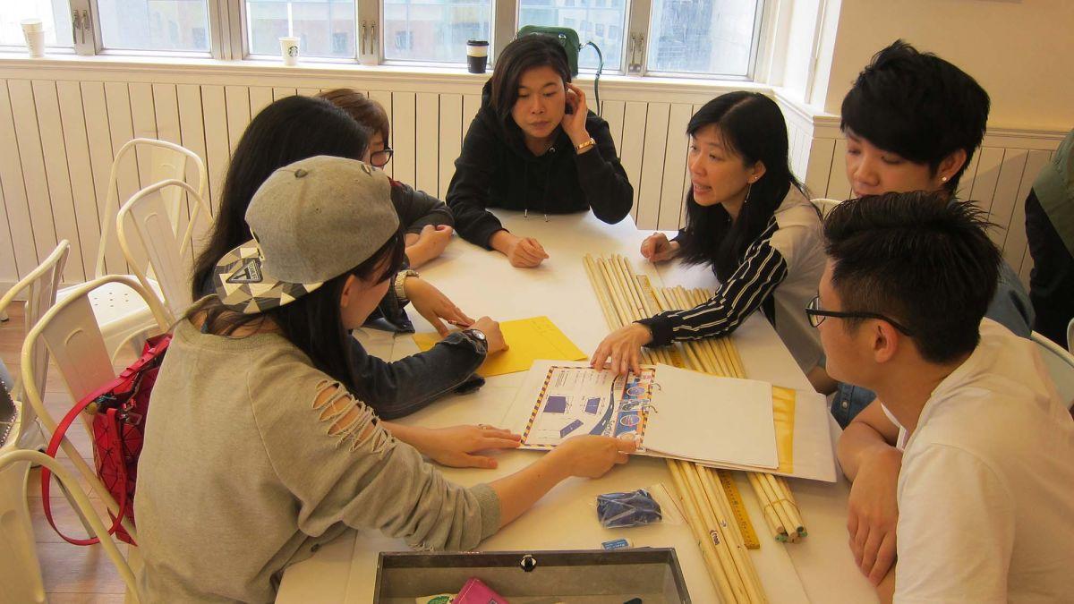 	group of employees engaging in teambuilding activity