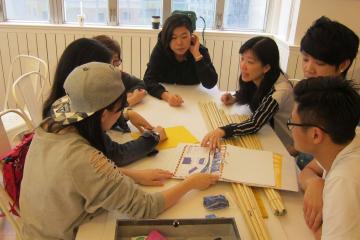 	group of employees engaging in teambuilding activity