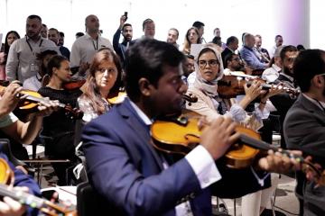 	orchestrate music team building activity