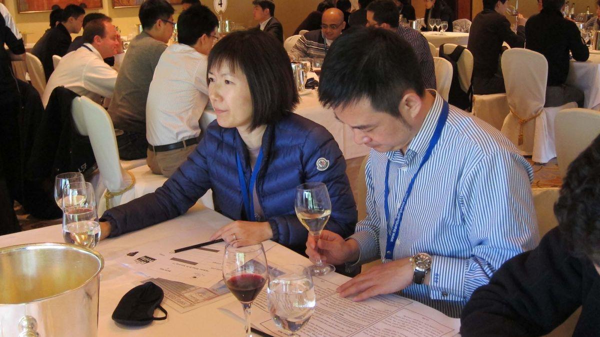 man and woman at table office party christmas