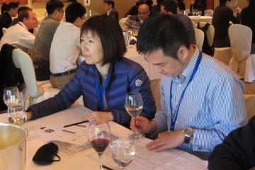 man and woman at table office party christmas