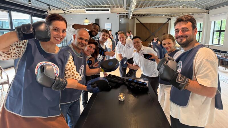 Indoor team building experience focused on trust, planning and coordination