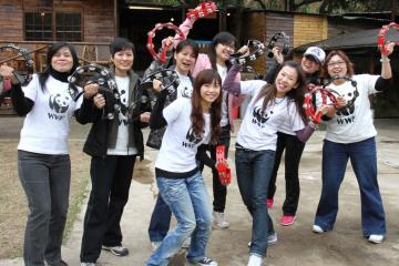 	team cheering at the camera for group picture music