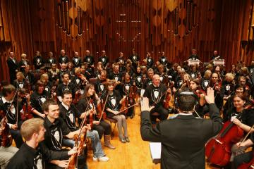 orchestrate music team building activity