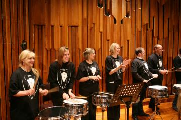 orchestrate music team building activity