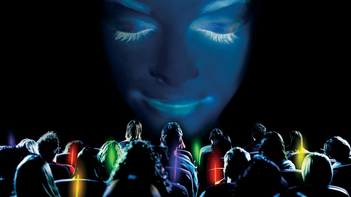 people waving coloured sticks selecting a mindfulness program in Catalyst team building Meditainment program