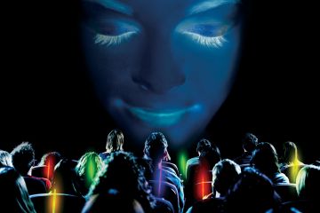 people waving coloured sticks selecting a mindfulness program in Catalyst team building Meditainment program