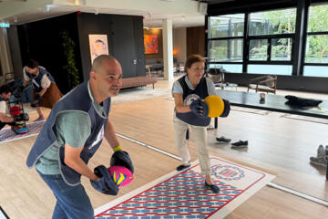 Corporate team building activity focused on communication and teamwork