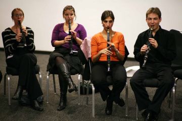 orchestrate music team building activity