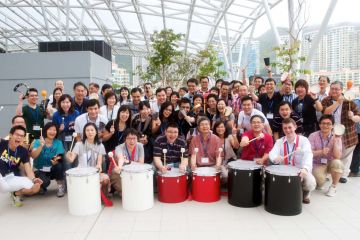 employees having fun beatswork team building activity