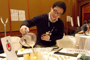 man pours juice into cups creative juices team buildingactivity