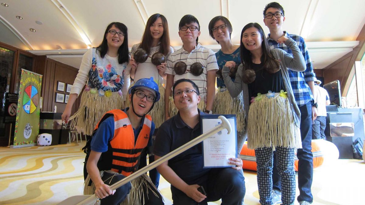 team celebrate together the outcome of rags to riches giving CSR activity