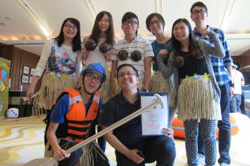 team group photo rags to riches charity team building event