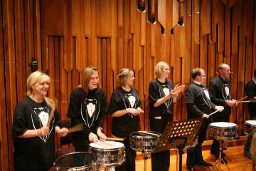 orchestrate music team building activity