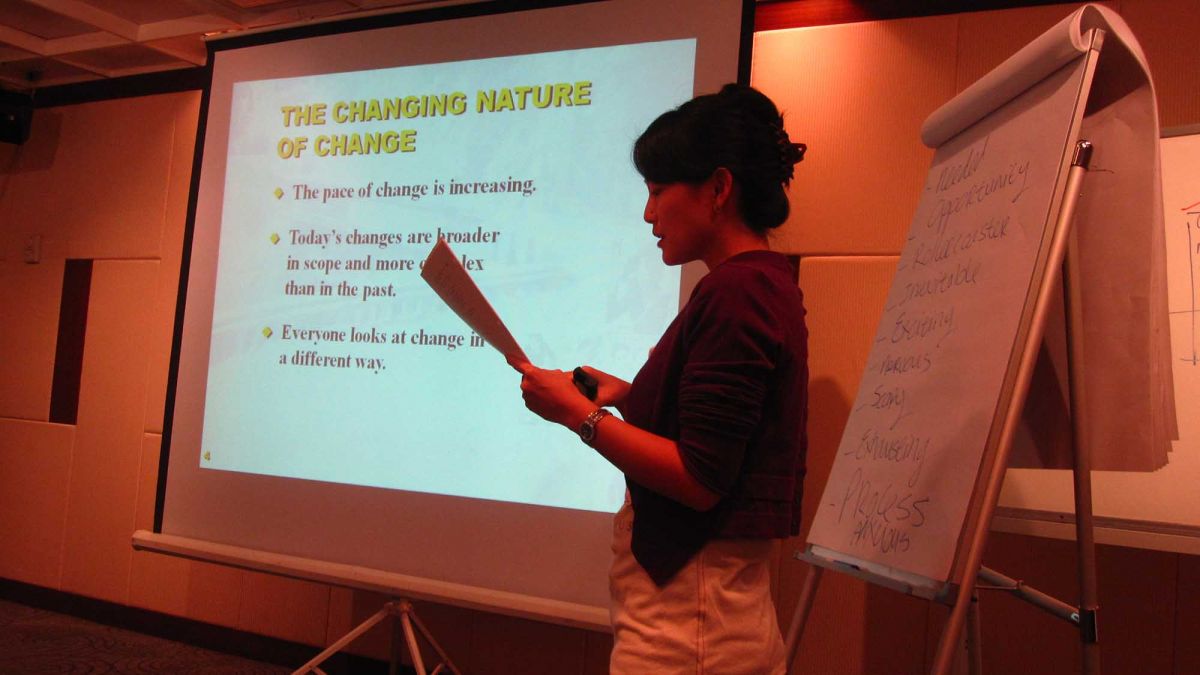 woman delivers speech about importance of changes