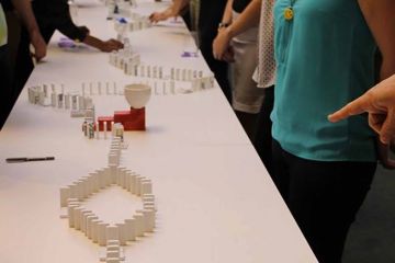 the domino effect creative team building activity