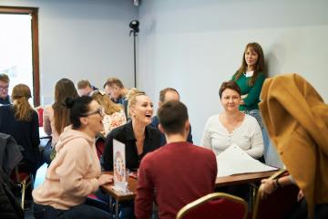 teams having fun playing impact