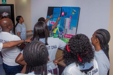 Team putting paintings together