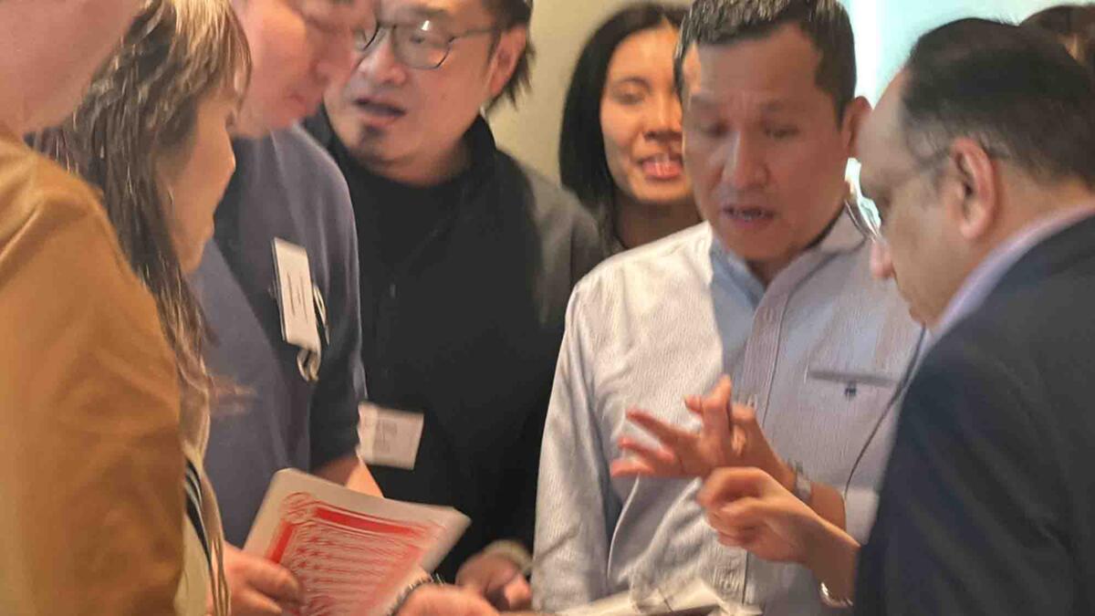 Group discussion showing diverse perspectives in a workshop setting