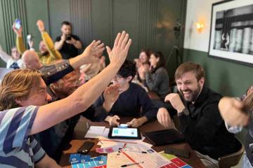 interactive AI team building game