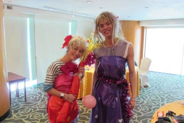 two women dressed up for haute couture team building activity