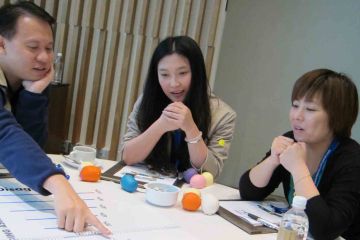 team collaborate in innovative team building game speak up speak out