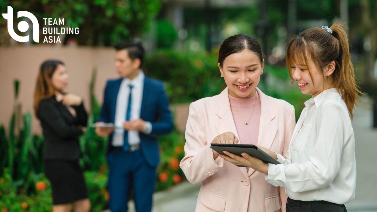 Two teams collaborating outdoors
