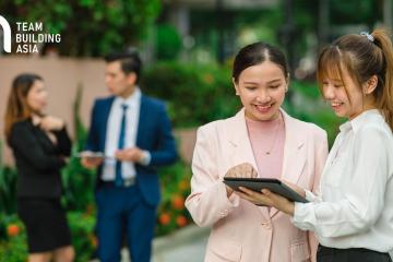Two teams collaborating outdoors