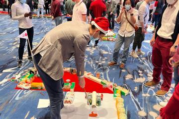 team playing golf for CSR team building