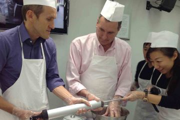 sausage sensation cooking team building activity