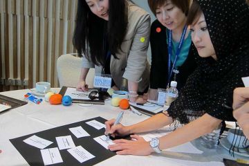 team collaborate in innovative team building game speak up speak out