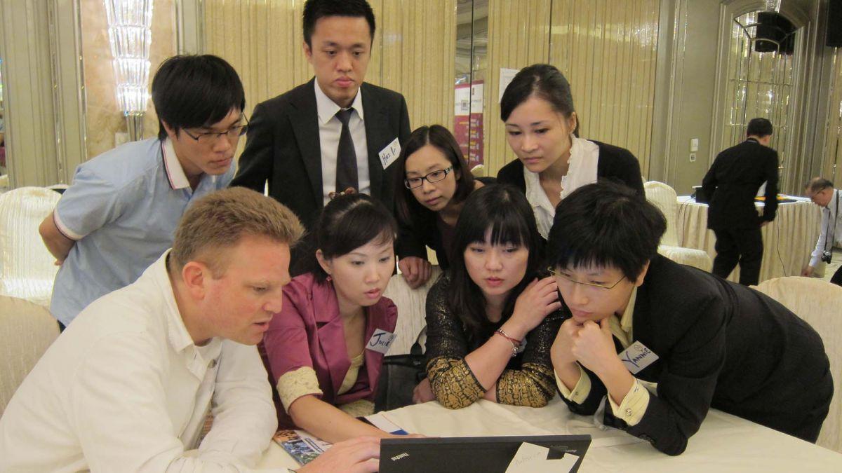 employees collaborate to complete you bet you can challenge big bets