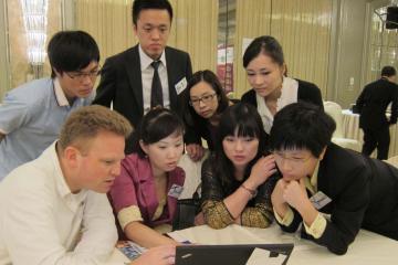 employees collaborate to complete you bet you can challenge big bets