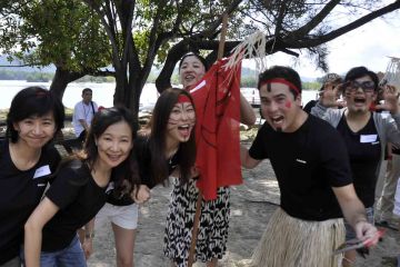 team photo two tribes fun team building game