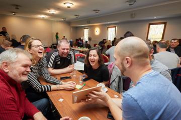 teams having fun playing impact