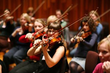 orchestrate music team building activity