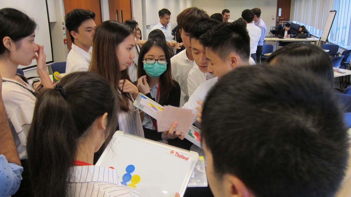 employees discussing ideas together team bonding brain