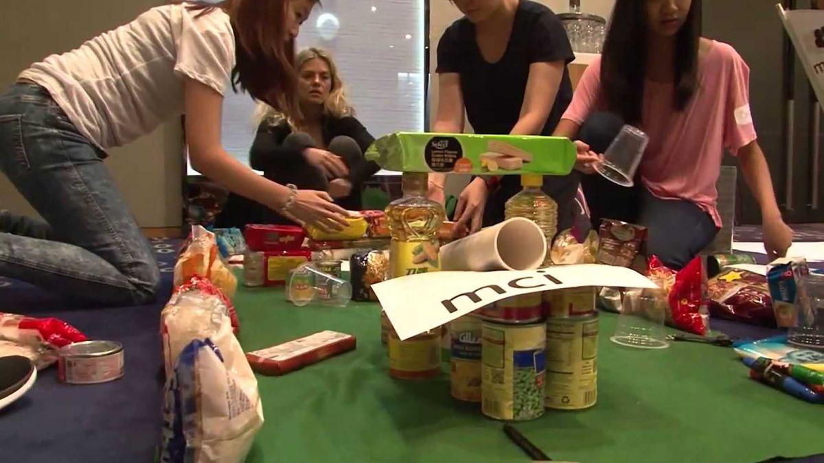 team being productive together in challenging activity 2015