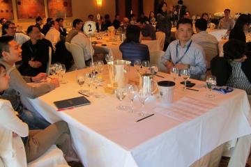 employees enjoying a corporate dinner event 2015