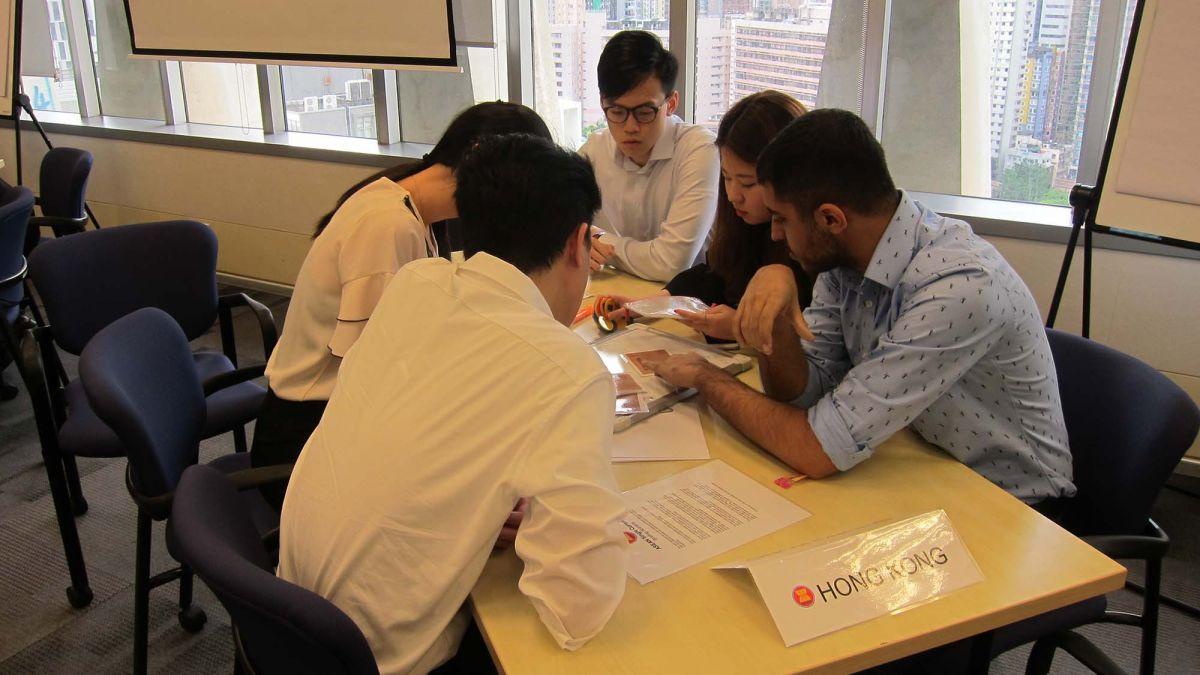 	employees cooperating at workplace pro