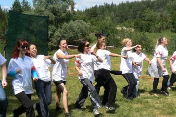 Multi-sensory team building experience with participants completing sensory challenges