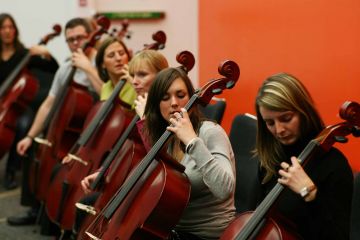 orchestrate music team building activity