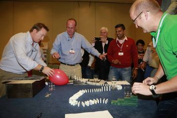 the domino effect creative team building activity