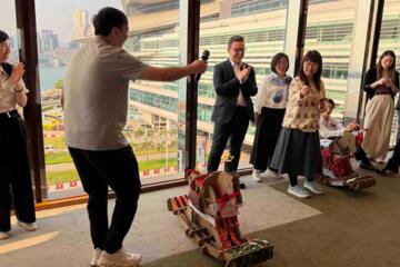 Teams celebrating victory in competitive team building race event