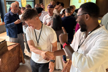 Participants solving interactive puzzle challenges in the Passport to Adventure team building activity.