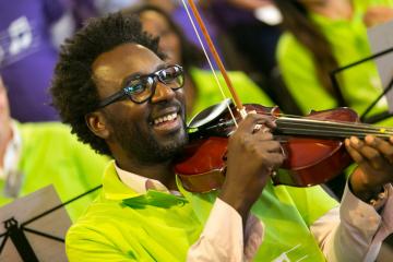 orchestrate music team building activity