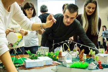 people collaborating building a city creative collaborative team building challenge